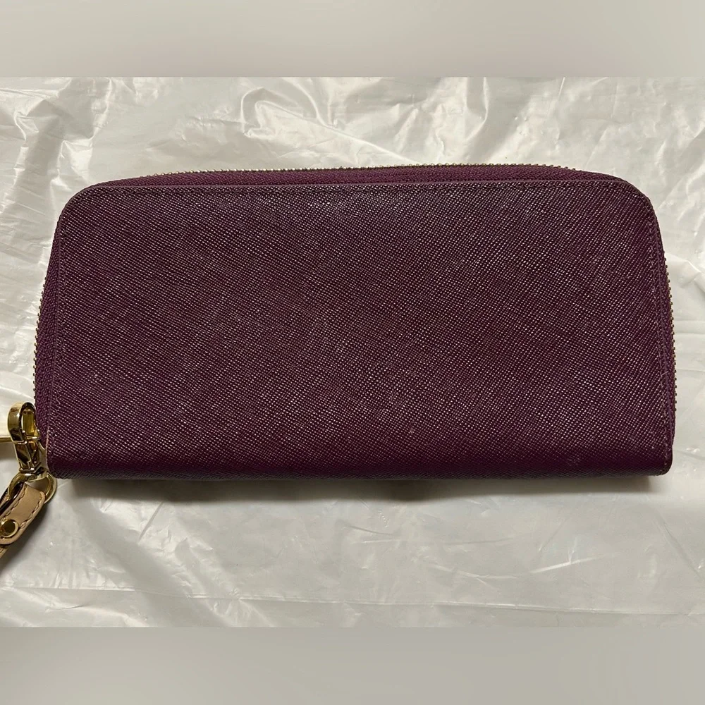 New Jet set Michael Kors Plum Zip Wristlet/wallet with Tan Strap - Picture 5 of 13